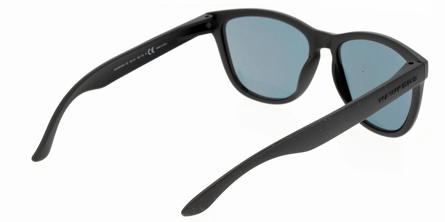 Lentes de Sol Hawkers O18TR48 Negro-Ópticas LUX, Ve Más Allá