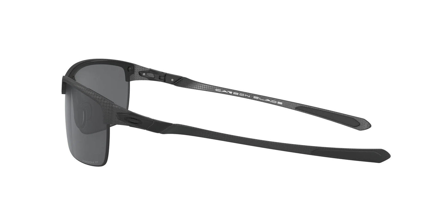 Lentes de Sol Oakley OO9174 Gris-Ópticas LUX, Ve Más Allá