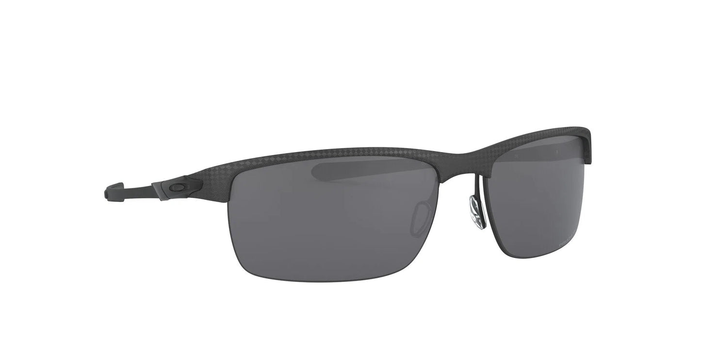 Lentes de Sol Oakley OO9174 Gris-Ópticas LUX, Ve Más Allá